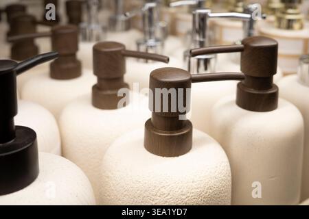 bathroom soap dispensers on store shelf, home decor accessories display. Concept: bathroom interior styling Stock Photo