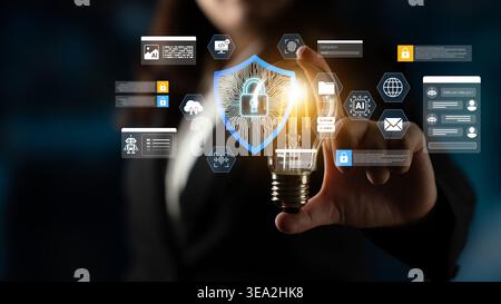 Innovative Concept of Cybersecurity with Light Bulb and Digital Icons Representing Protection and Data Security Concepts for Business Solutions Ledger Stock Photo