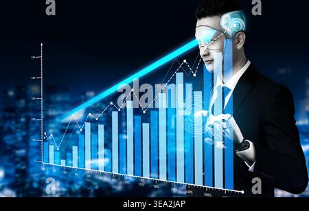 A businessman uses advanced technology to analyze data, showcasing growth through digital graphs and visual elements, symbolizing innovation in the Stock Photo