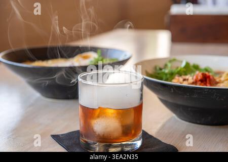 Shun-sational Old Fashioned cocktail and ramen at Sazan, Austin, Texas, October 14, 2025. (Photo by John Anderson) Stock Photo