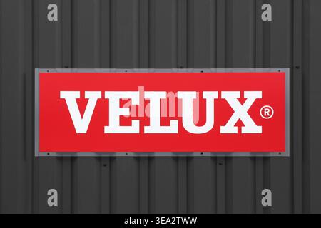 Saint Georges, France - April 27, 2024: Velux logo on a wall. Velux is a Danish company that specializes in windows and skylights Stock Photo