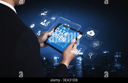 Data-driven decision-making empowers business through analytics, datum collection, and AI systems. Data driven tools support cloud data processing and Stock Photo