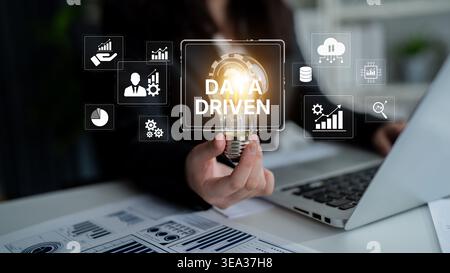 Data-driven decision-making empowers business through analytics, datum collection, and AI systems. Data driven tools support cloud data processing and Stock Photo