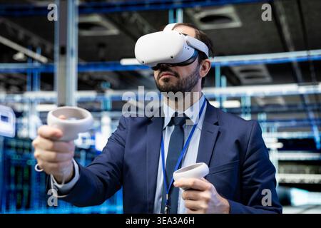 Data center technician using VR headset tech to evaluate hardware diagnostic reports. Server room IT expert using virtual reality simulation technology to automate supercomputers processing Stock Photo