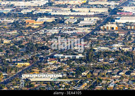 Aerial perspective shows multilane highway traffic and urban infrastructure across Phoenix Arizona Stock Photo