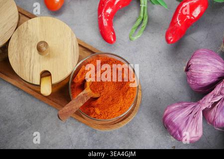 Spices and fresh ingredients on a gray kitchen counter Stock Photo