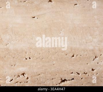 High resolution beige travertine stone texture background, porous natural limestone surface Stock Photo