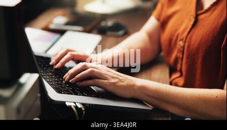 Laptop, hands and programmer with business woman in office for web developer, coder or typing. Software engineer, firewall update and coding system Stock Photo