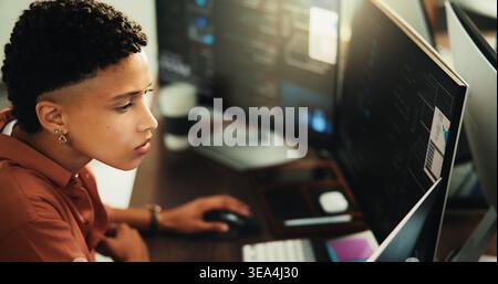 Reading, coding and computer with business woman in office for web programmer, it expert or research. Software engineer, developer update and database Stock Photo