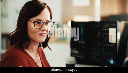 Glasses, programmer and computer with business woman in office for web developer, it expert or research. Software engineer, coding update and database Stock Photo