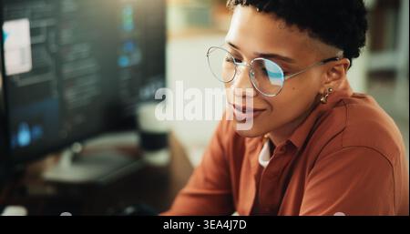 Glasses, developer and computer with business woman in office for web programmer, it expert or research. Software engineer, coding update and database Stock Photo