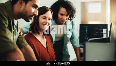 Computer, coding and smile with business people in office for programmer review, research and project. Web developer, software engineer and tech Stock Photo
