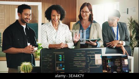 Developer, smile and computer with business people in office for database, team and cyber security. Software engineer, firewall update and feedback Stock Photo