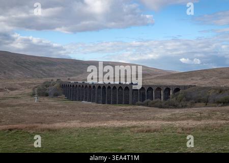 A West Coast mainline diversion due to planned engineering works sees Avanti West Coast EveroClass 805 unit crossing Ribblehead Viaduct Stock Photo