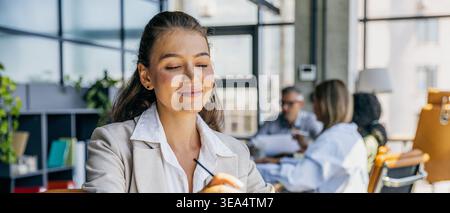 Employees participate in stress relief activities together Stock Photo