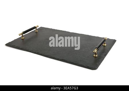 Serving slate stone tray isolated on white background. Empty black stone platter with handles for food. Stock Photo