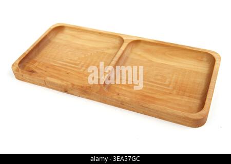 Portion wooden dish isolated on white background. Empty squared serving plate or tray. Stock Photo