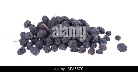 Dried aronia berries isolated on white background. Dry black chokeberry. Clipping path Stock Photo