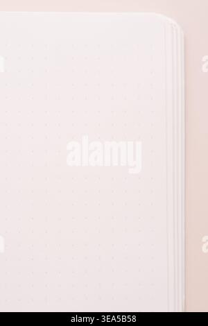 Blank notebook page close up on soft beige background Stock Photo