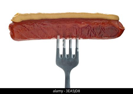Fork with sausage in mustard, isolated on white background Stock Photo