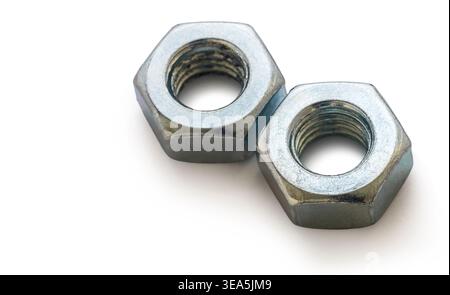 Construction nuts close-up on a white isolated background Stock Photo