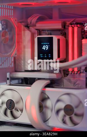 Custom gaming PC interior with white liquid CPU cooler Stock Photo