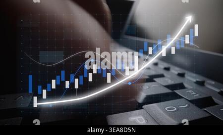 Dynamic image of a keyboard with an overlay of a financial chart. This visual represents the analysis of market trends and the growth potential in Stock Photo