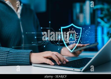 AI cybersecurity protection concept. Person using laptop and smartphone with digital shield and artificial intelligence chip representing data securit Stock Photo