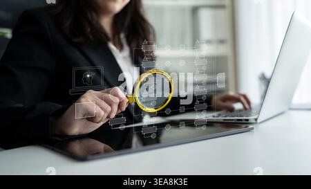 Businesswoman Analyzing Digital Data with Magnifying Glass and Laptop in Modern Office Setting for Technology and Innovation Concepts Quark. Stock Photo