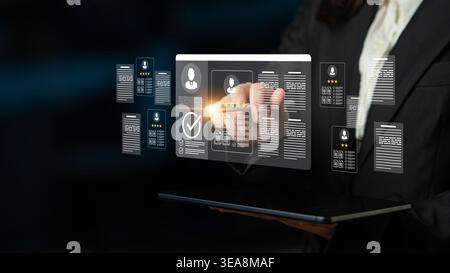 A business professional interacts with an advanced digital interface, highlighting data analytics and user profiles, emphasizing the importance of Stock Photo