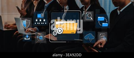 Abstract Concepts of Digital Technology with Diverse Professionals in Business Attire Engaging in Tasks Related to Data Management and Innovation Stock Photo