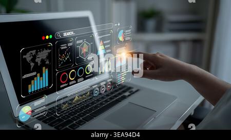 Innovative Data Analysis with Touchscreen Interaction on Laptop Displaying Graphs and Charts in a Modern Work Environment Quark. Stock Photo