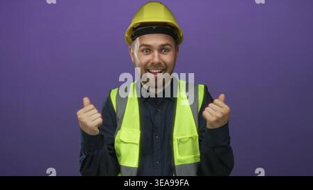 Builder man wearing yellow hardhat and high visibility vest points finger to chest in purple studio; safety concern confused. Stock Photo