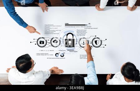 Group of professionals engaging in a meeting discussing data security strategies focused on securing digital assets and raising awareness about Stock Photo