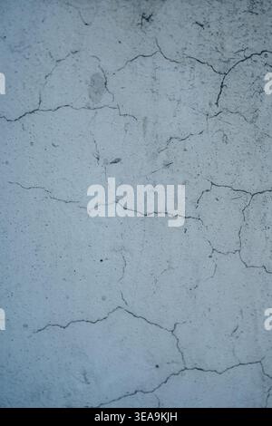 Gentle Bluegray Painted Wall Exhibiting Fine Cracks And Subtle Peeling For Design Purposes Stock Photo