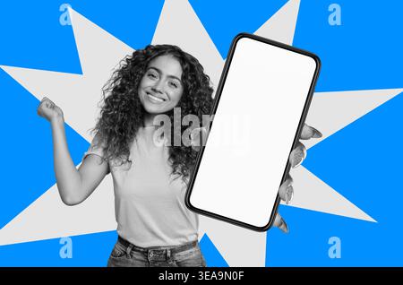 Girl With Curly Hair Shows Smartphone With Blank Screen on Blue Star Background in Modern Setting Stock Photo