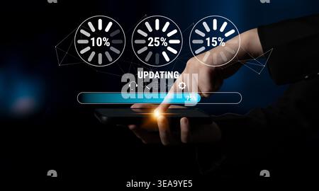 A concept of a system update and software installation. A progress bar and loading icons showing the update percentage and status. Motif Stock Photo