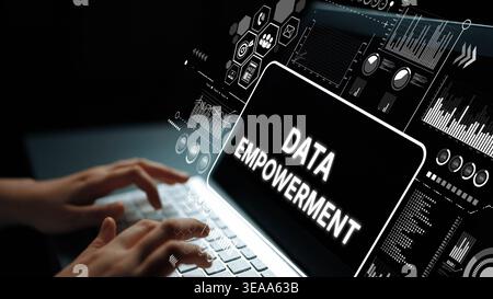 Hands typing on laptop with glowing screen displaying data empowerment, charts and graphics in a digital workspace concept. Asymptotic smart data Stock Photo