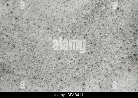 Soap suds foam and bubbles create an organic, textured background element. Stock Photo