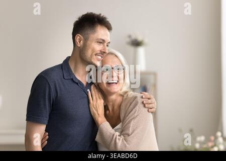 Family looking into distance with dreamy and pensive expression Stock Photo