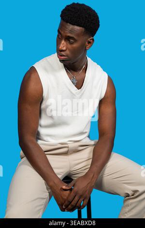 Young black man with a serious expression looking away at copy space Stock Photo