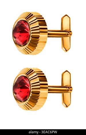 Pair of golden cufflinks with red gems isolated on white background Stock Photo