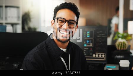 Portrait, programmer and man in office, funny and software development for website launch. Employee, programming or person in workplace, coding and Stock Photo