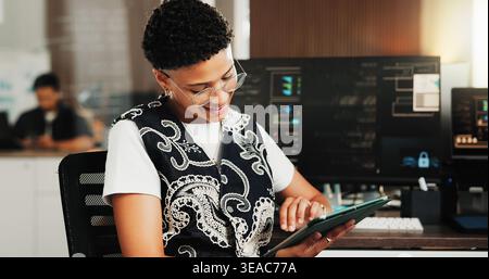 Business, woman and programmer with tablet in office for web design, coding or app development. Female person, employee or coder with smile on Stock Photo