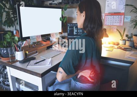 Screen, computer or woman with back pain in home office for burnout, app development or remote work. Red glow, freelance web designer and sore spine Stock Photo