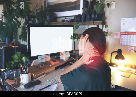 Screen, computer or woman with neck pain in home office for burnout, debugging or remote work. Red glow, freelance web designer or back with joint Stock Photo
