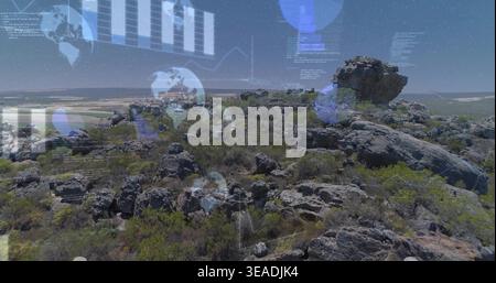 Displaying rugged rocky outcrop centering on dry hill, revealing HUD elements and large boulder Stock Photo