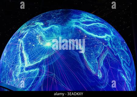 13 January 2026, Dubai Expo City, UAE: Digital earth displaying an illuminated global network with data lines representing connectivity and technology Stock Photo