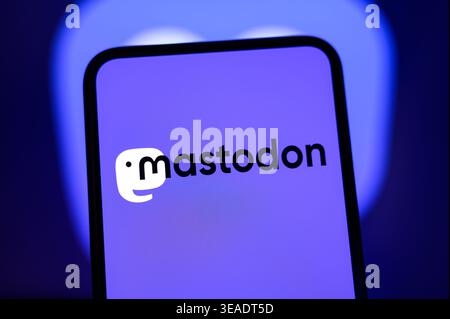 Paris, France - April 22, 2026: The Mastodon social network logo on a purple screen, amid reports of a DDoS attack on its main server. Stock Photo