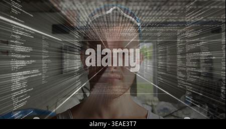 Facing adult man wearing white tank top and sunglasses on head at home, displaying code overlay Stock Photo